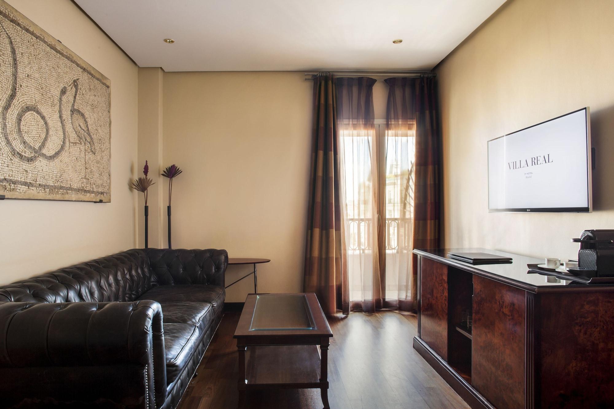 Hotel Villa Real, A Member Of Preferred Hotels & Resorts Madrid Exterior photo A living room in a hotel